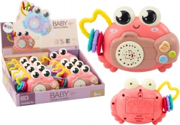 Roze interactieve krab met projector en rammelaar op batterijen