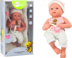 Babypop in wit-roze outfit met fopspeen en mutsje