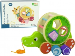 Houten trekspeeltje krokodil met sorteerder