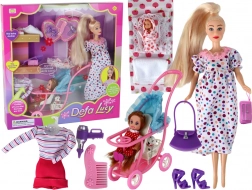 Zwangere pop Lucy met accessoires