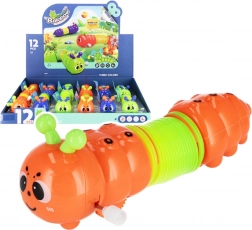 Opwindrups – kunststof bewegend speelgoed 14 cm