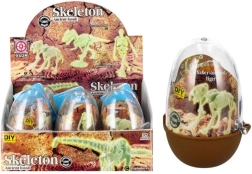 Gloeiende dinosaurus-skelet in een plastic eitje – verzamelbare bouwset