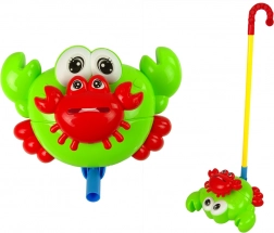 Duwspeelgoed op stok – groene krab met belletje