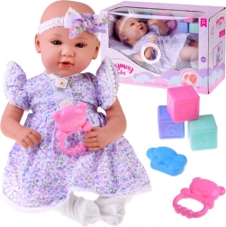 Interactieve baby 46 cm in lila jurk met accessoires