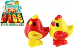 Springend kunststof kuikentje met sleutelaandrijving 7 × 9 cm, 2 kleuren