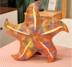 Pluchen gele zeester kussen 20 cm