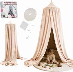 Beige hangende kindercanopy boven het bed