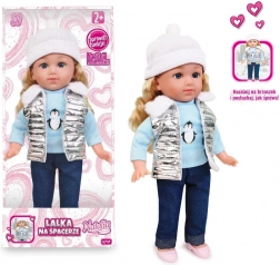 Pratende pop Natalia met zilverkleurig vest