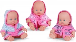 Schattige baby in gekleurde badjas