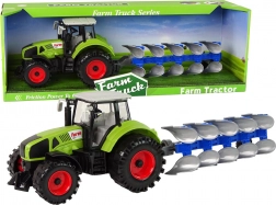 Tractor met ploeg op vliegwiel