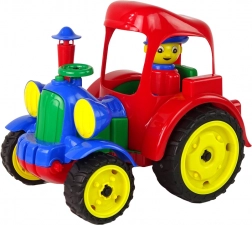 Grote kunststof tractor met figuurtje en rubberen wielen HEMAR