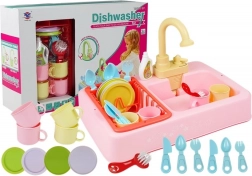 Kleurige gootsteen met water + accessoires