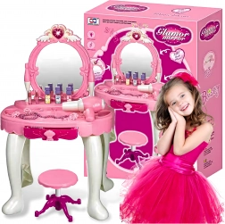 Roze kinderkaptafel met spiegel en krukje met accessoires