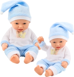 Baby pop in blauwe pyjama met muts met pompon