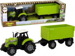 Groene landbouwtractor met aanhanger