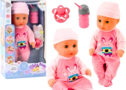 Baby pop met roze kleding en geluidseffecten