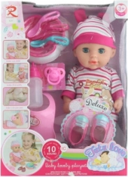 Baby 30 cm met geluiden en plasfunctie met accessoires