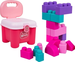 Set zachte bouwblokken met roze opbergbakje in de vorm van een stoeltje