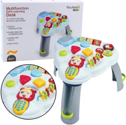 Interactieve driehoekige educatieve tafel met telefoon, lichtjes en geluiden