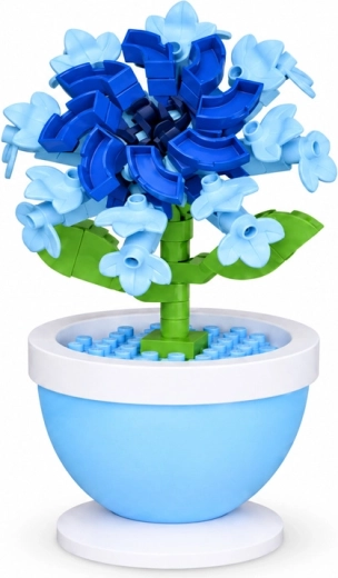 Blauwe hibiscus in een decoratieve bloempot