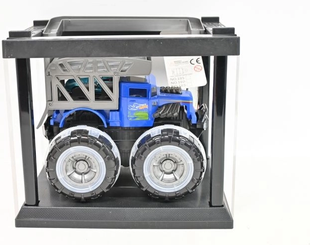 Monstertruck in kooi met klein autootje