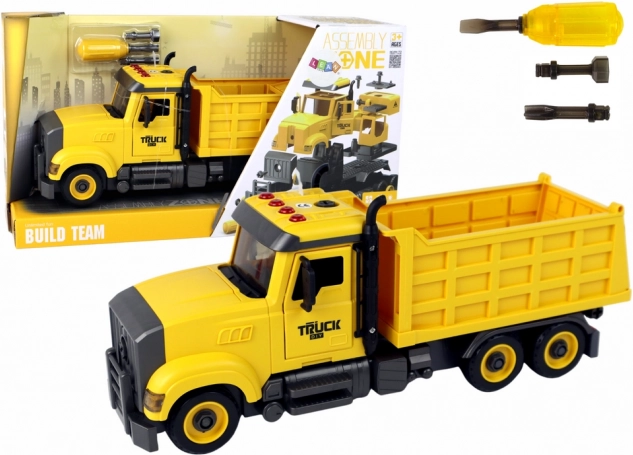 Gele kiepwagen met geluiden en schroefset