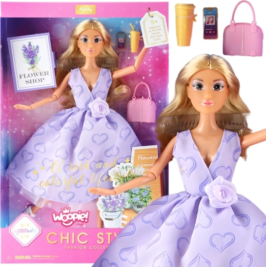 Woopie pop Lily met lang blond haar 30 cm in lavendelkleurige jurk met accessoires