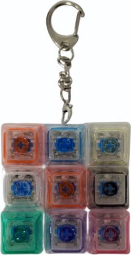 Anti-stress sleutelhanger met mechanische knop en LED-achtergrondverlichting