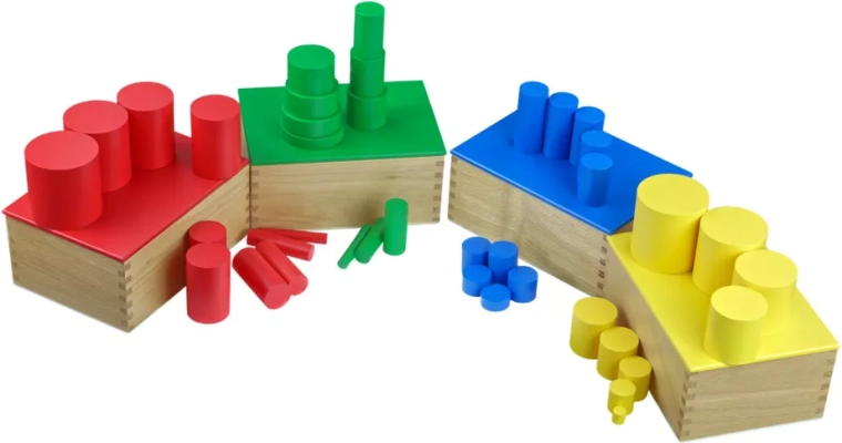 Gekleurde cilinders zonder handgrepen van beukenhout Moyo Montessori