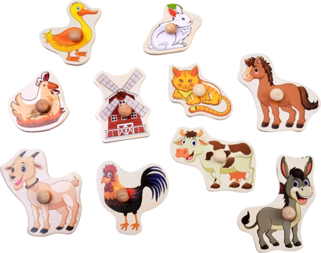 10 boerderijmotieven op een houten bord