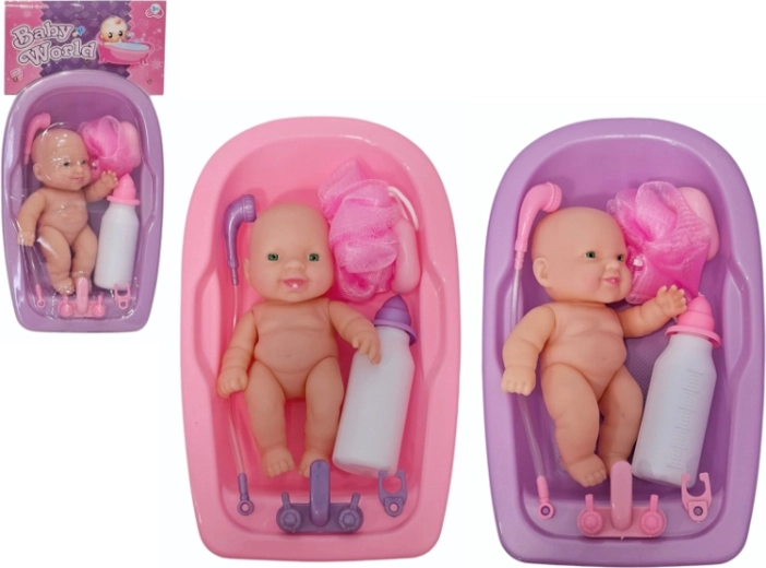 Babypop in badje met accessoires - 1 stuk