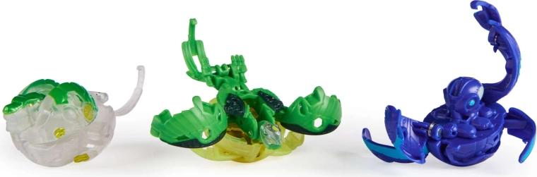 Drie transformerende Bakugan-figuren