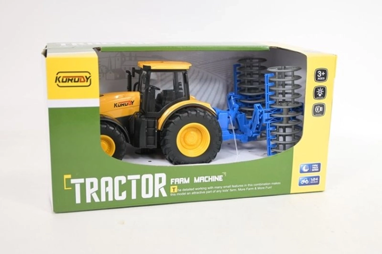 Tractor met aankoppelbare ploeg met licht en geluid