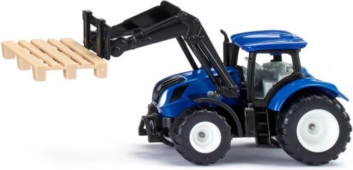 New Holland tractor met vorken en pallets