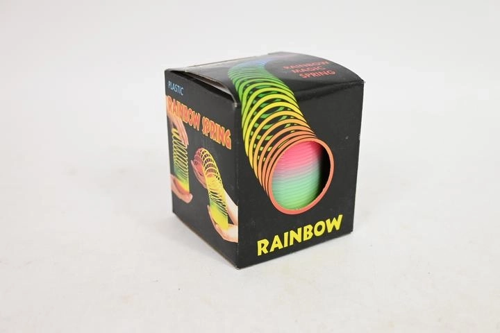 Regenboog slinky-veer 5 cm in doosje