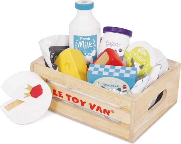 Houten krat met zuivelproducten voor kinderen