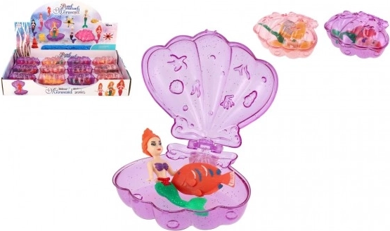 Zeemeermin in een openslaande schelp met accessoire, plastic 10 cm