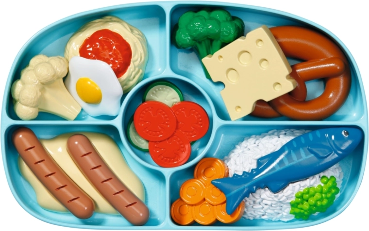 Uitgebreid feestmaal voor de pop