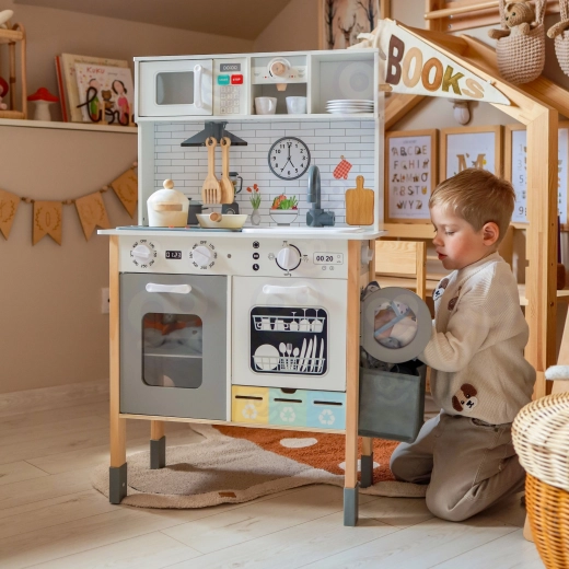 Wasmachinezone met mand om zelfstandigheid te trainen