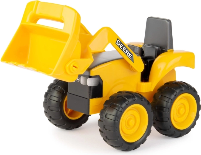 Tractor/loader voor het scheppen en verplaatsen van materiaal