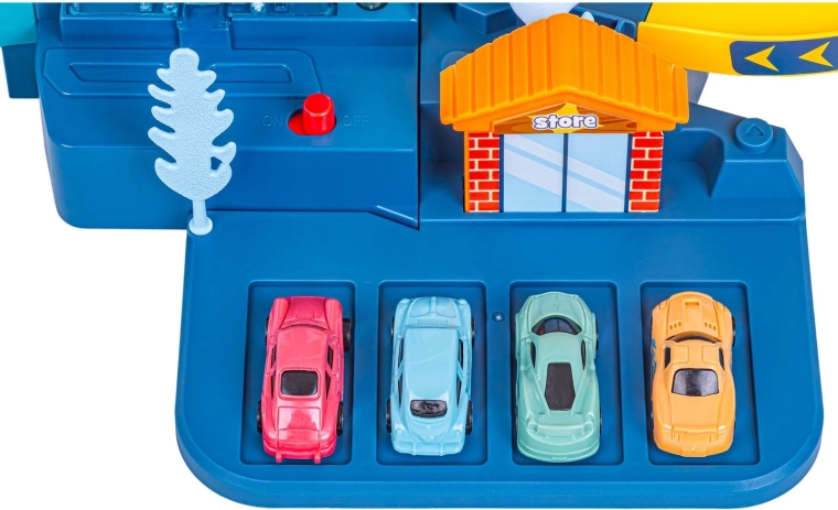 Parkeerplaatsen en 4 autootjes in de verpakking