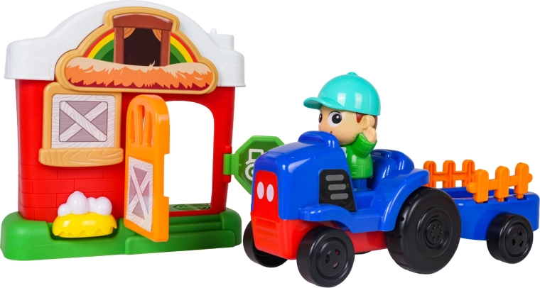 Tractor met aanhanger en openende stal