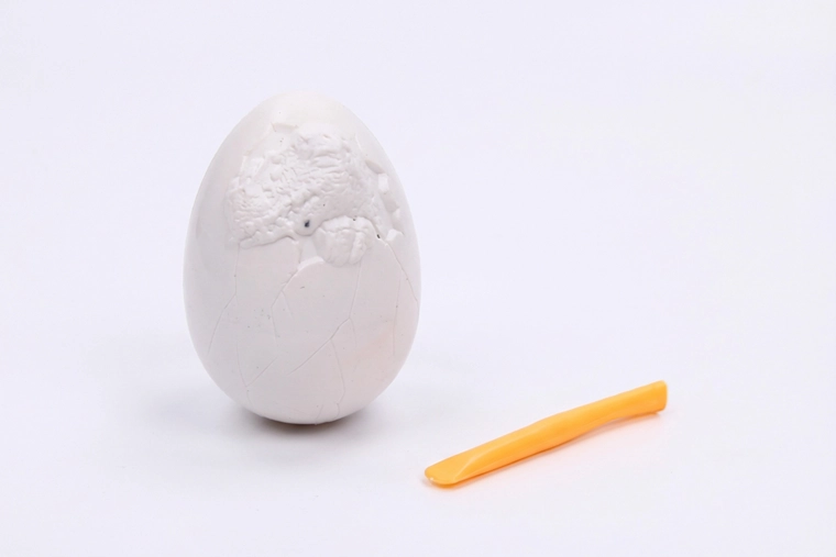 Dino DIY-ei met op te graven figuren - 1 stuk