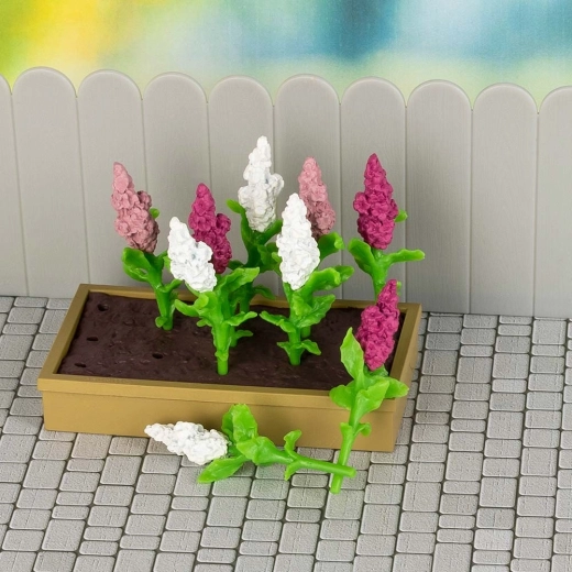 Bloeiende bloembak en bloemen om scènes te stylen