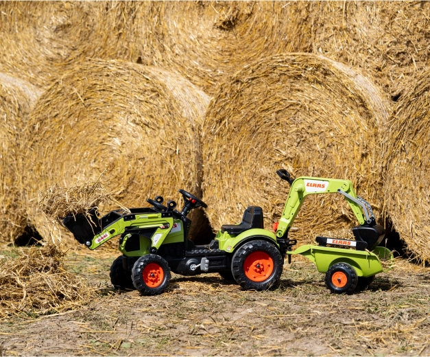 Werkende lader en graafarm