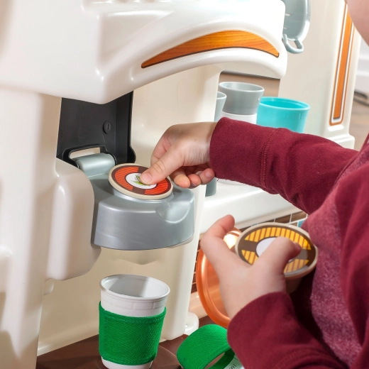 Koffiezetapparaat met capsules zoals bij volwassenen