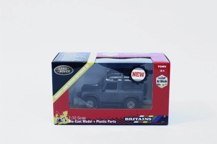 Model off-road auto TOMY Britains Land Rover Defender 90 in de modder 1:32