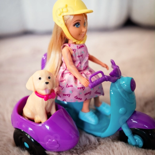Scooter met aanhangwagentje