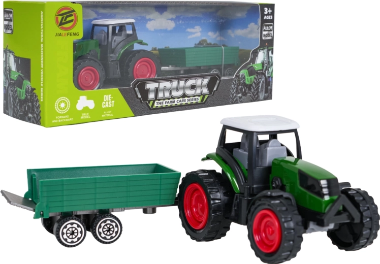 Groene tractor met aanhanger