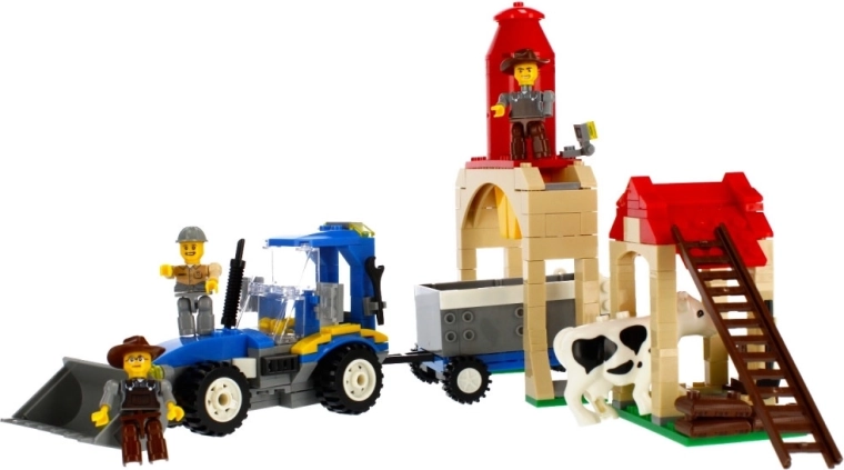 Tractor met voorlader en aanhanger